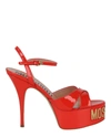 Moschino Logo Plaque Platform Sandals In Orange