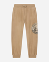DOLCE & GABBANA COTTON JOGGING trousers WITH COIN PRINT