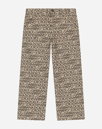 Dolce & Gabbana Kids' Printed Denim Trousers With All-over Logo In Neutral