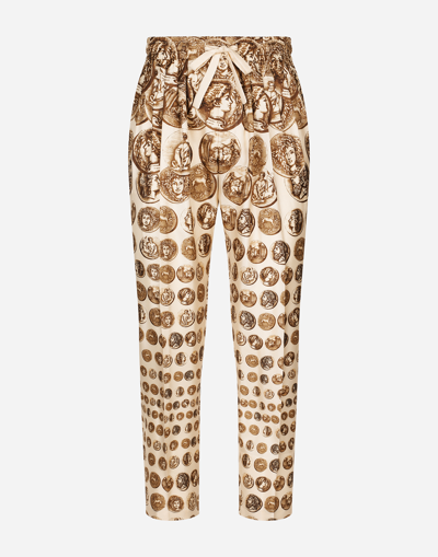 Dolce & Gabbana Coin Print Silk Twill Jogging Trousers In Brown