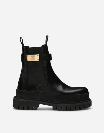 Dolce & Gabbana Calfskin Ankle Boots With Branded Strap In Schwarz