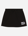 DOLCE & GABBANA SHORT JERSEY SKIRT WITH DG LOGO PATCH