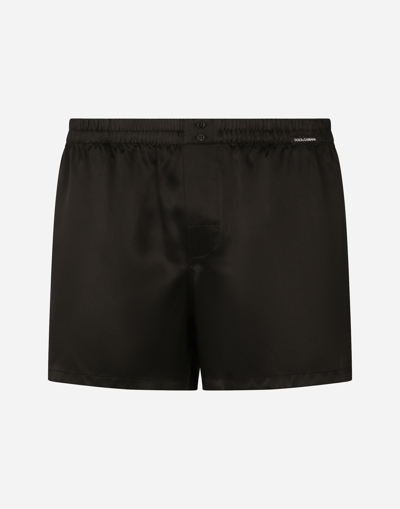 Dolce & Gabbana Silk Shorts With Logo Label In Black