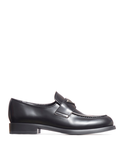 Prada Unlined Brushed Leather Loafers In Black