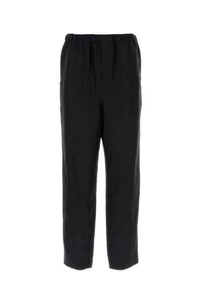 Saint Laurent Tapered Shell Trousers In Black