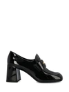 Miu Miu Patent Leather Loafers In Black