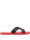 CHRISTIAN LOUBOUTIN CHRISTIAN LOUBOUTIN LOUBI CROSS FLAT SANDALS