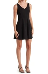 Bebe Luxe Bandage V-neck A-line Dress In Black