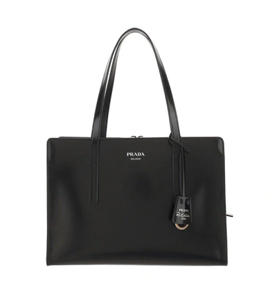 Prada Logo Detailed Zipped Tote Bag In Black