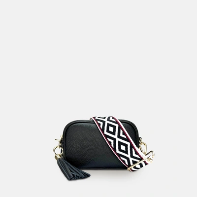 APATCHY LONDON THE MINI TASSEL BLACK LEATHER PHONE BAG WITH BLACK & RED AZTEC STRAP