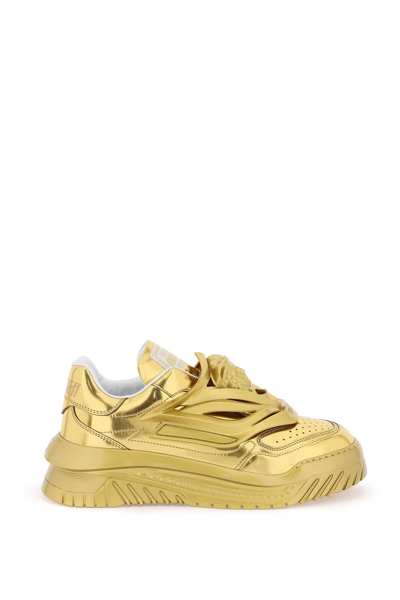 Versace Odissea Metallic-effect Trainers In Gold