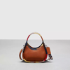 COACH MINI ERGO BAG WITH CROSSBODY STRAP IN COACHTOPIA LEATHER WITH UPCRAFTED SCRAP BINDING