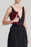Altuzarra Medallion Envelope Satin Clutch Bag In Deep Garnet