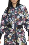 NIKE THERMA-FIT OVERSIZE REVERSIBLE FLORAL BOMBER JACKET
