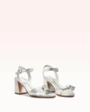Alexandre Birman Clarita Flare Metallic Leather Block Heel Sandals In Silver
