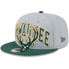 NEW ERA NEW ERA GRAY/HUNTER GREEN MILWAUKEE BUCKS TIP-OFF TWO-TONE 9FIFTY SNAPBACK HAT