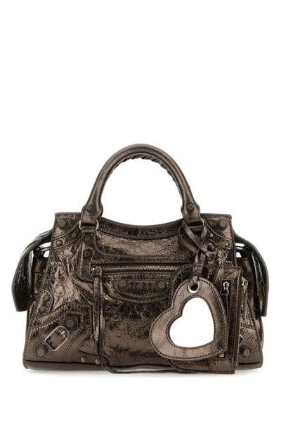 Balenciaga Neo Cagole Xs Metallic-leather Handbag In Brown