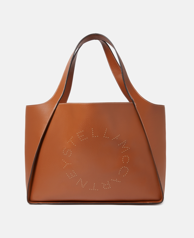 Stella Mccartney Logo Studded Grainy Alter Mat Tote Bag In Pecan