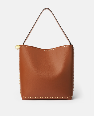 Stella Mccartney Frayme Studded Grainy Alter Mat Tote Bag In Brown