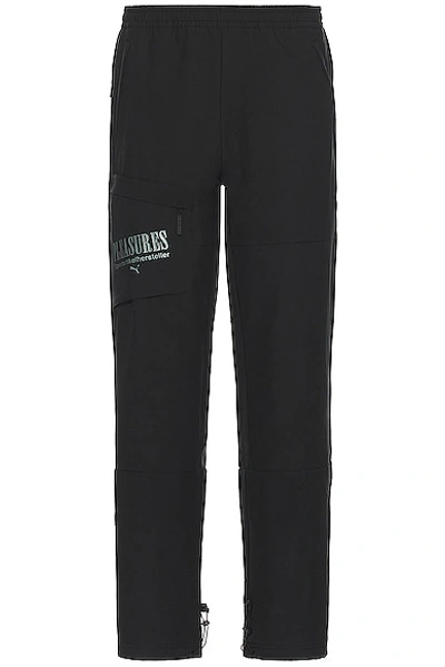 Puma X Pleasures Logo Printed Track Pants In Black