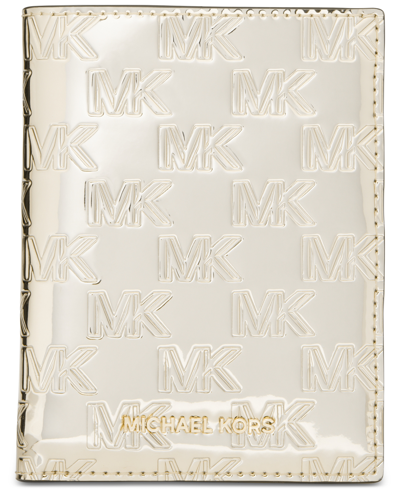 Michael Kors Michael  Logo Medium Embossed Passport Wallet In Pale Gold