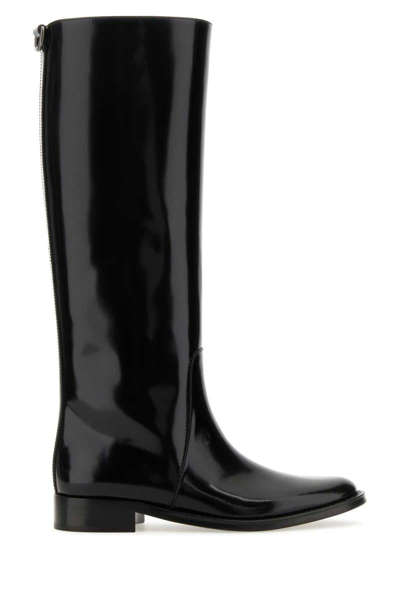 Saint Laurent Hunt Leather Knee-high Boots In Black