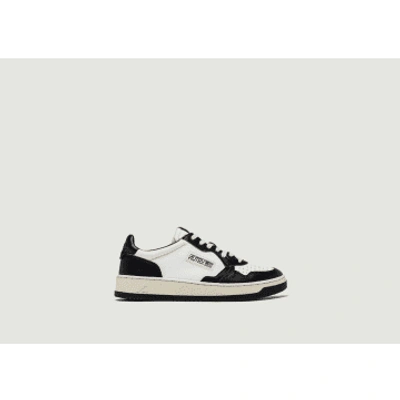 AUTRY MEDALIST LOW SNEAKERS IN WHITE AND BLACK LEATHER