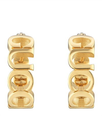 Gucci Script Letter Hoop Earrings In Gold