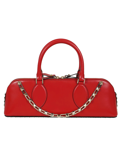 Valentino Garavani Duffle Rockstud Red Calf Leather Handbag In Rouge Pur