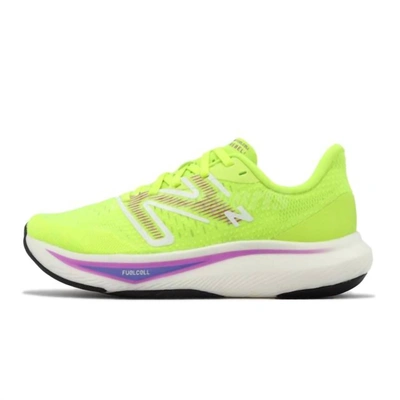 New Balance Women's Fuel Cell Rebel V3 Shoes In Thirty Watt Cosmic Rose In Green/blue/pink