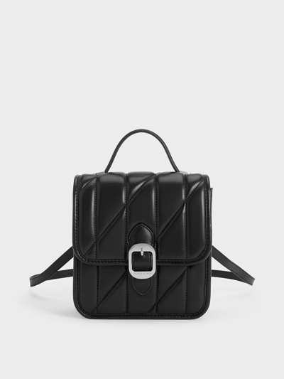 Charles & Keith Lin Quilted Belted Backpack In Black