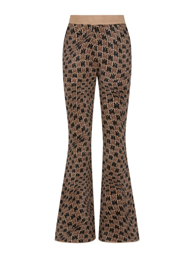 Amiri Monogram-print High-rise Woven-blend Trousers In Brown