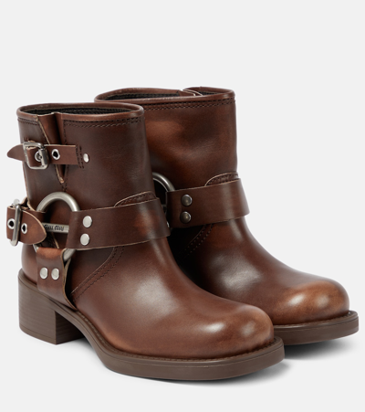 Miu Miu Studded Leather Ankle Boots In Brown