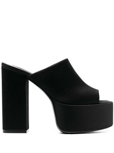 PARIS TEXAS BLACK MULES WITH OVERSIZED PLATFORM IN SILK