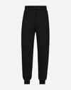 DOLCE & GABBANA JOGGING PANTS WITH RHINESTONE-DETAILED DG PATCH