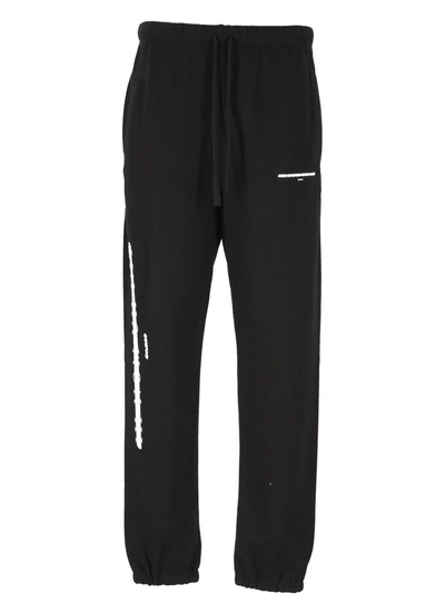 Ih Nom Uh Nit Graphic-print Cotton Track Trousers In Black