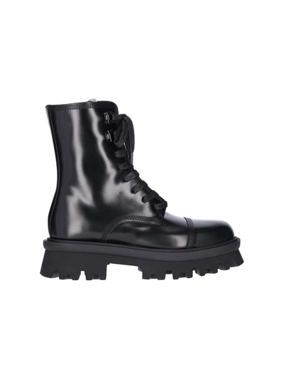 Ferragamo Boots In Black