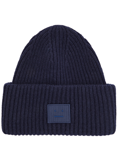 Acne Studios Pansy Logo Ribbed Wool Beanie In Blue