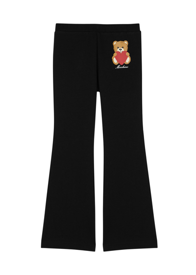 Moschino Kids Printed Flared Stretch-cotton Sweatpants (4-8 Years) In Black