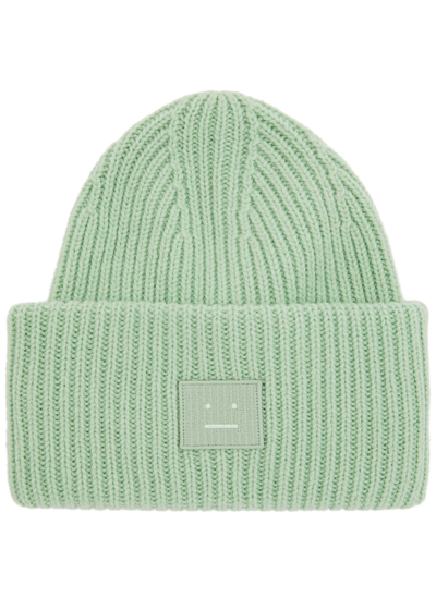 Acne Studios Pansy Logo Ribbed Wool Beanie In Green