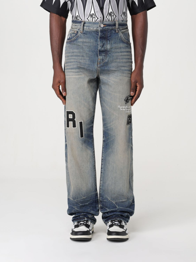 Amiri Logo-patch Distressed Jeans In Vintage Indigo