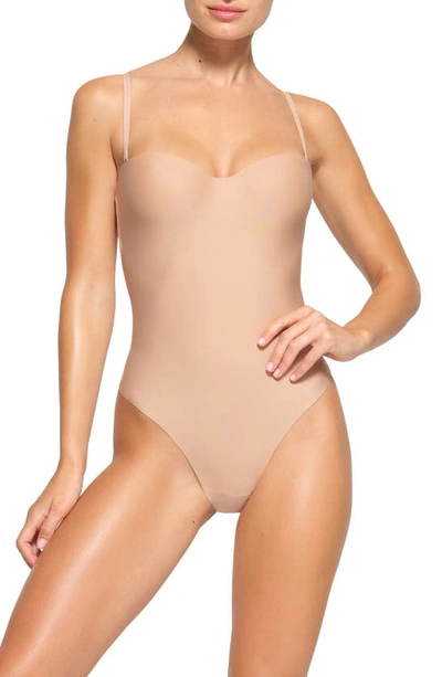 Skims Moulded Underwire Thong Bodysuit In Clay