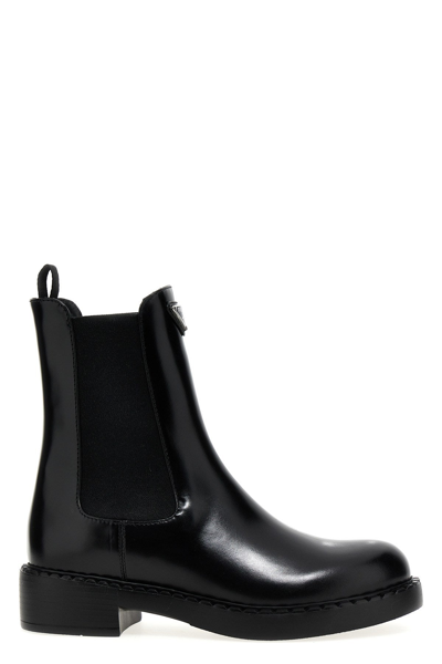 Prada Logo Plaque Brushed-effect Ankle Boots In Black