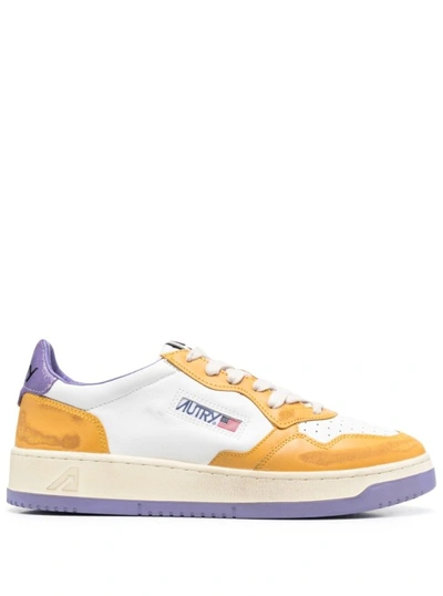 AUTRY COLOR-BLOCK YELLOW AND PURPLE 'MEDALIST' LOW TOP SNEAKERS IN COW LEATHER