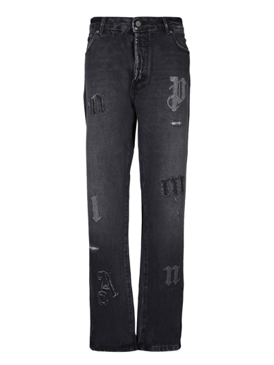 PALM ANGELS ALL-OVER APPLICATIONS BLACK JEANS