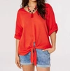 APRICOT BATWING TOP IN ORANGE