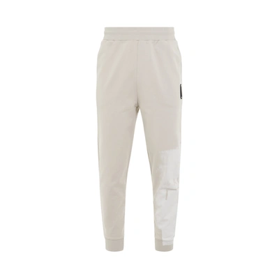 A-cold-wall* Brushstroke Tapered Track Pants In Neutrals