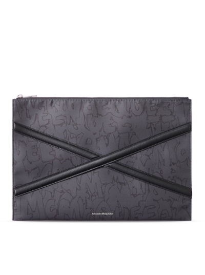 Alexander Mcqueen Logo Printed Zipped Clutch Bag In Black