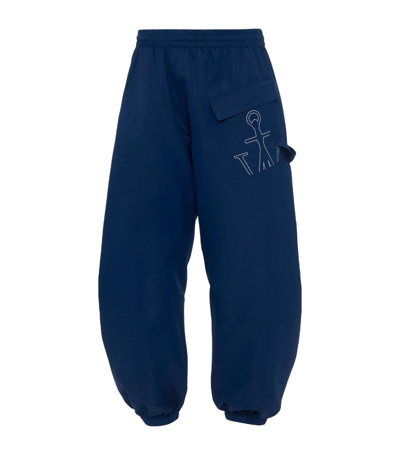 Jw Anderson Twisted Anchor-embroidered Track Trousers In Airforce Blue