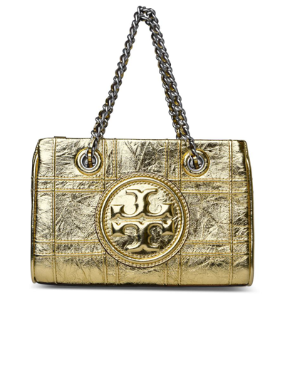 Tory Burch Handbags. In Gold